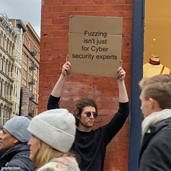 Man branding a sign in a busy street: Fuzzing isn't just for Cyber security experts