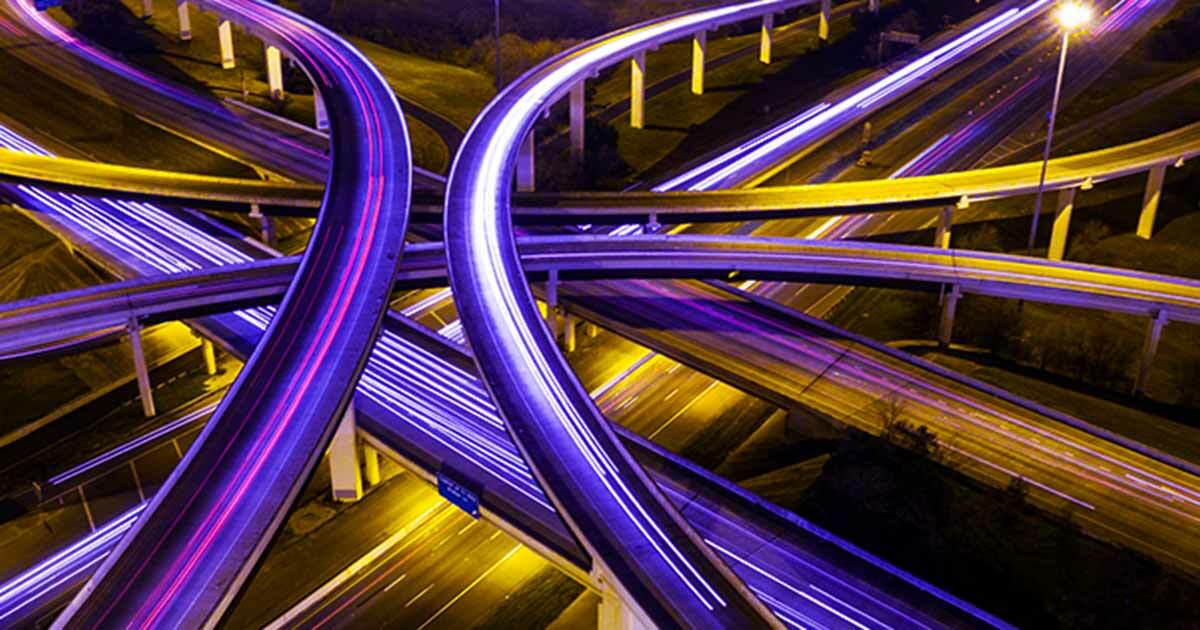 Above looking down view of purple highways overlapping illustrating the complexity of segmenting a network.